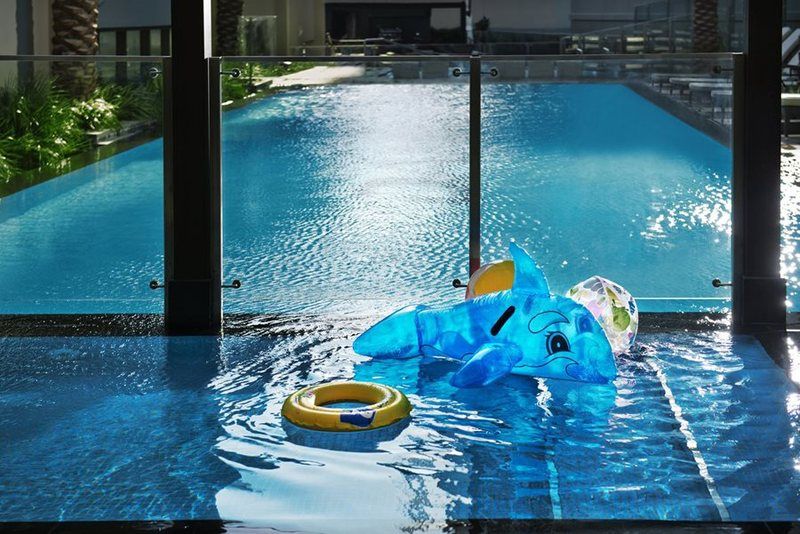Damac Maison The Vogue Dubai Exterior photo The swimming pool at the Ritz-Carlton, Singapore