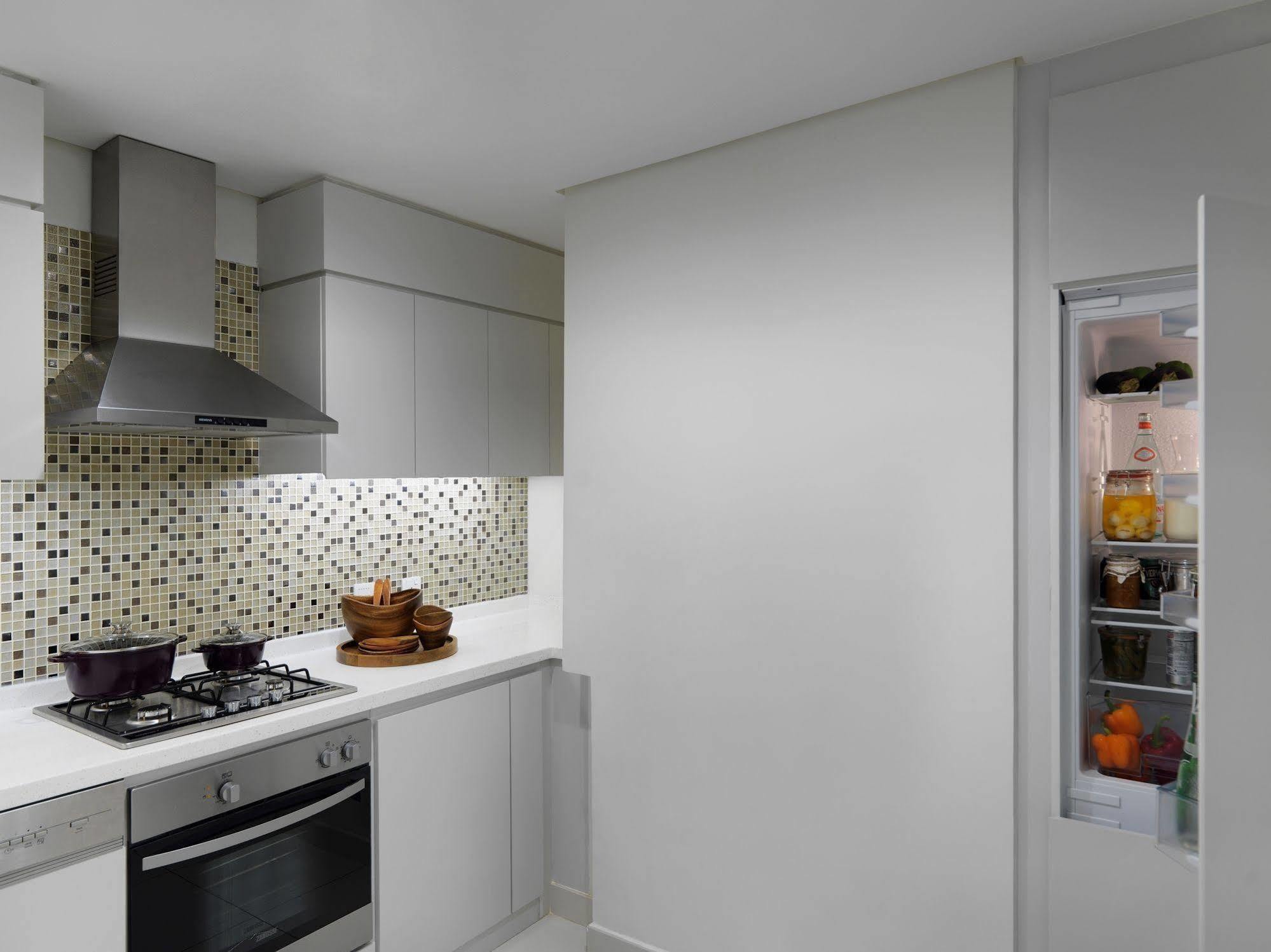 Damac Maison The Vogue Dubai Exterior photo A built-in refrigerator