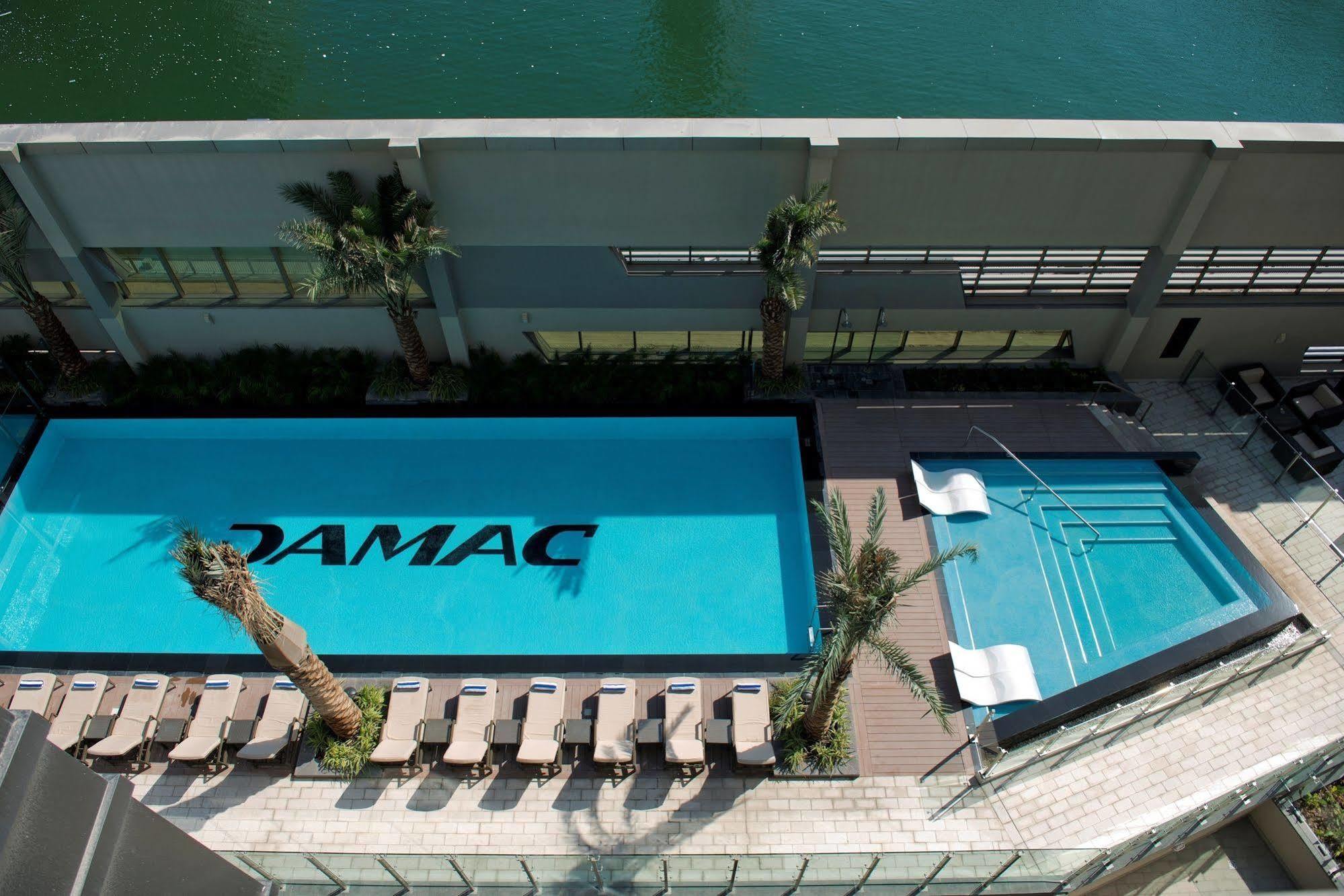 Damac Maison The Vogue Dubai Exterior photo The pool at the TAMAC headquarters