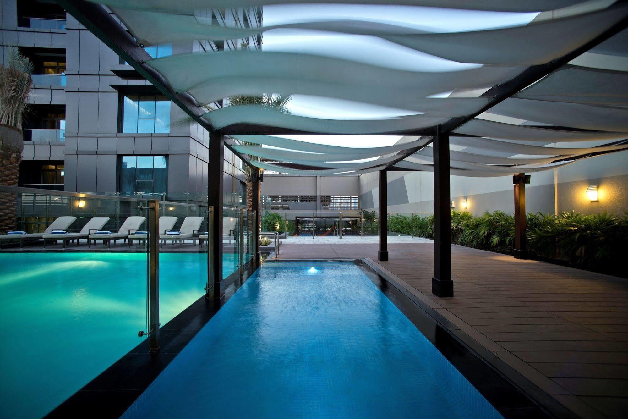 Damac Maison The Vogue Dubai Exterior photo The swimming pool at the hotel